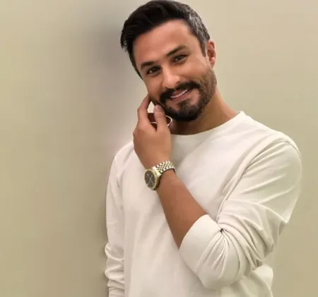 دانلود آهنگ تمام دنیا یک طرف تو یک طرف عزیزم از راغب  دانلود آهنگ تمام دنیا یک طرف تو یک طرف عزیزم از راغب